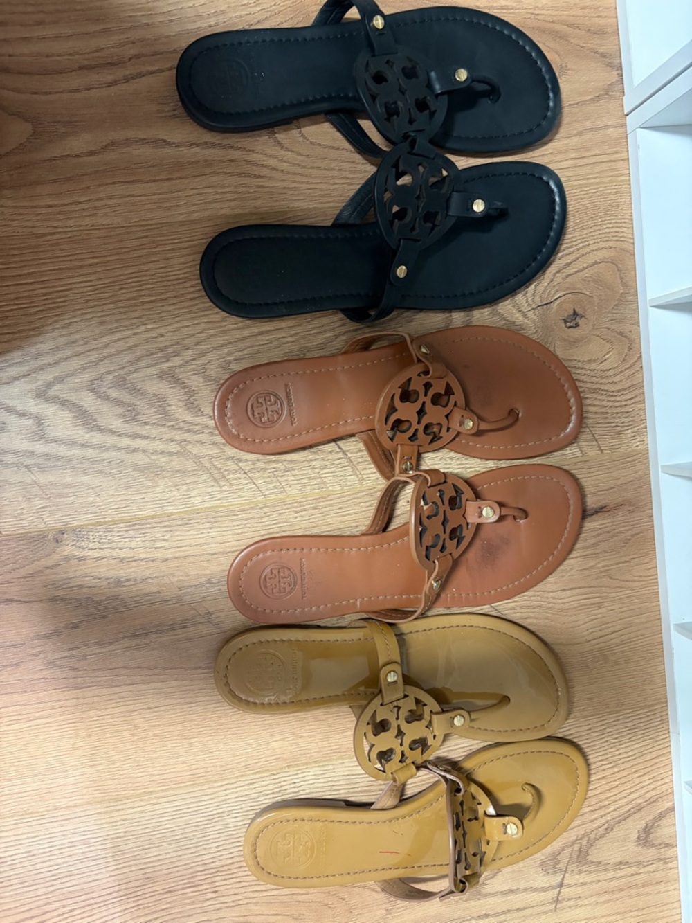 Tory Burch Leather Circle-Logo Thong Sandals in Black, Brown, Mustard